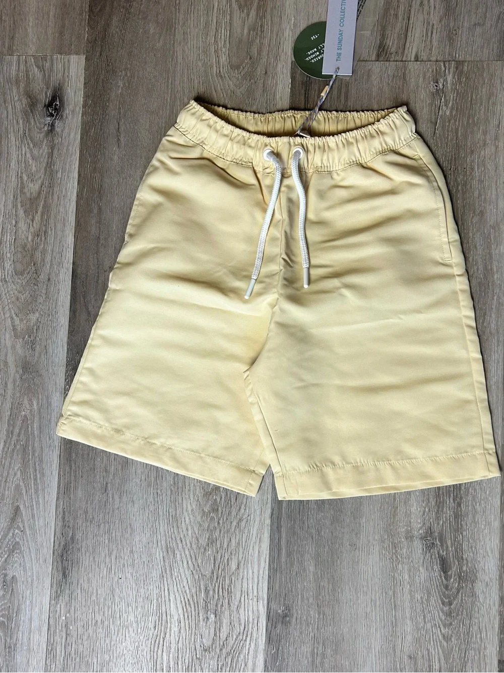 Kid’s Drawstring Swim Shorts in Pale Yellow